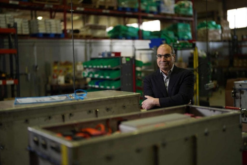 Jon Williams inside former auto parts factory